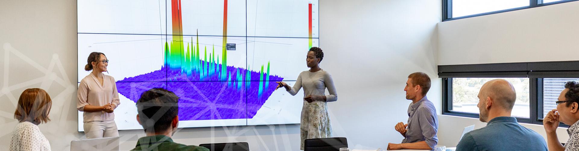 Group of researchers in a science technology classroom