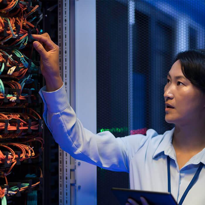 scientist working in server room