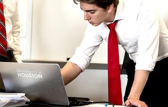 two students deliver a presentation